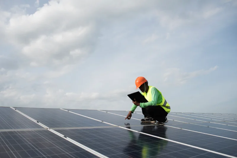 technician-engineer-checks-maintenance-solar-cell-panels (1) (1)